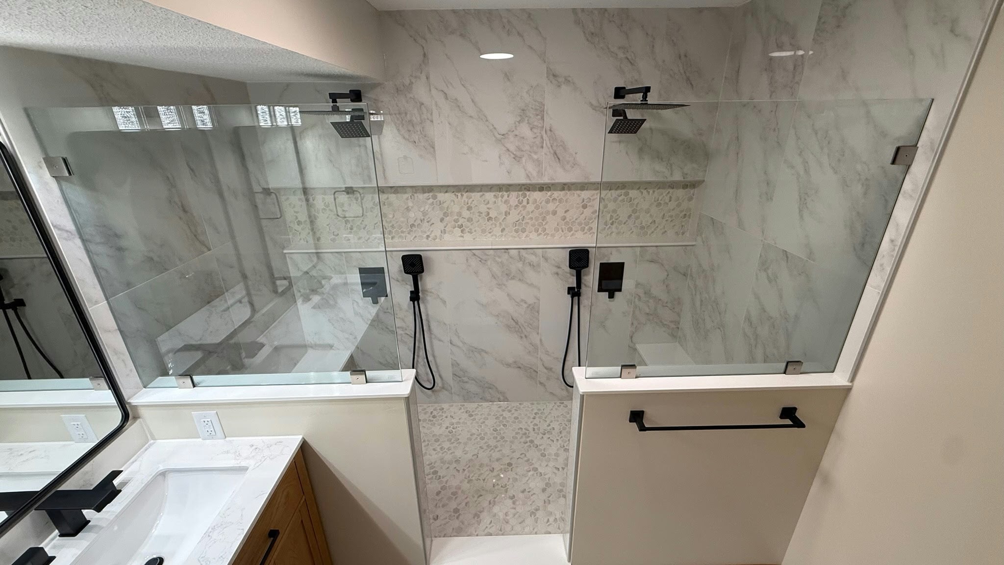 Walk-in shower with glass doors